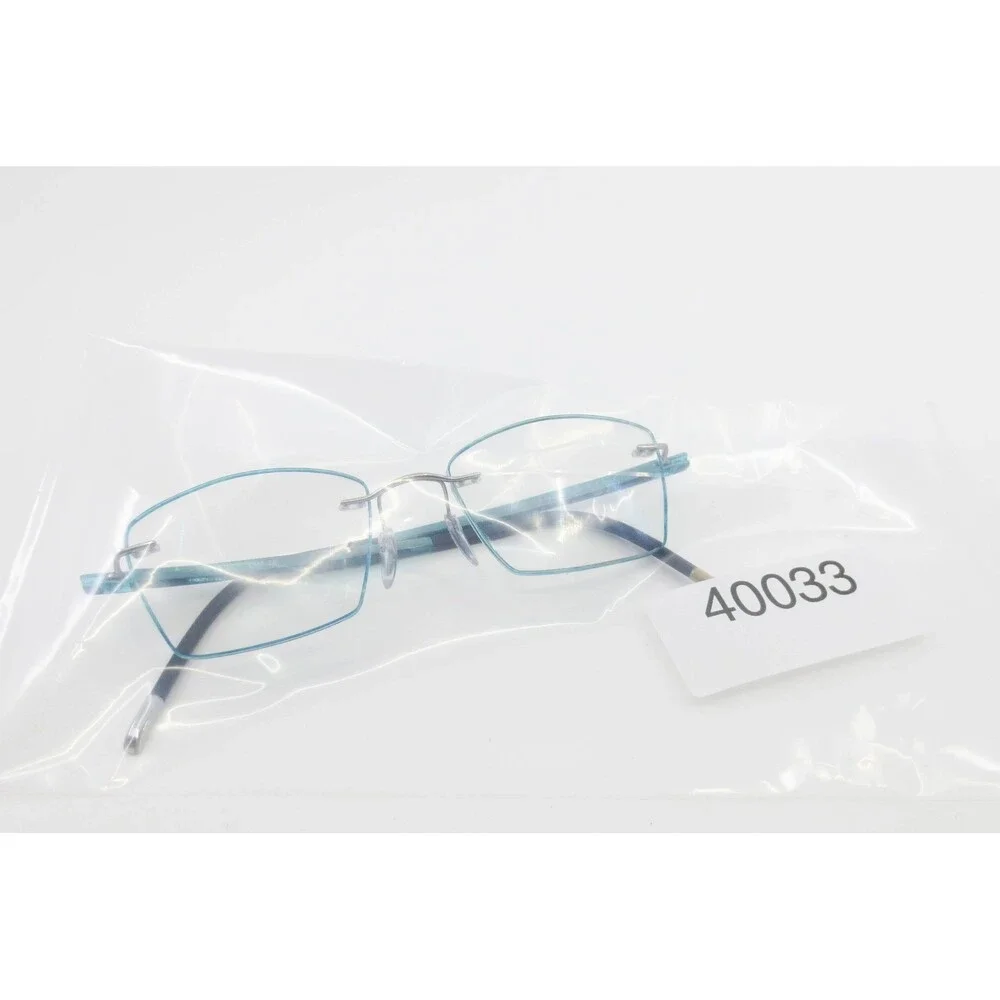 Silhouette 7642 10 6055 Teal Blue Rimless Eyeglasses Frames Austria 53-17-140